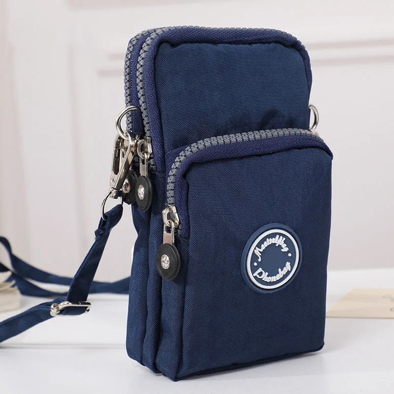 

A new small casual single-shoulder storage bag for men, a mobile phone bag, and a practical coin purse