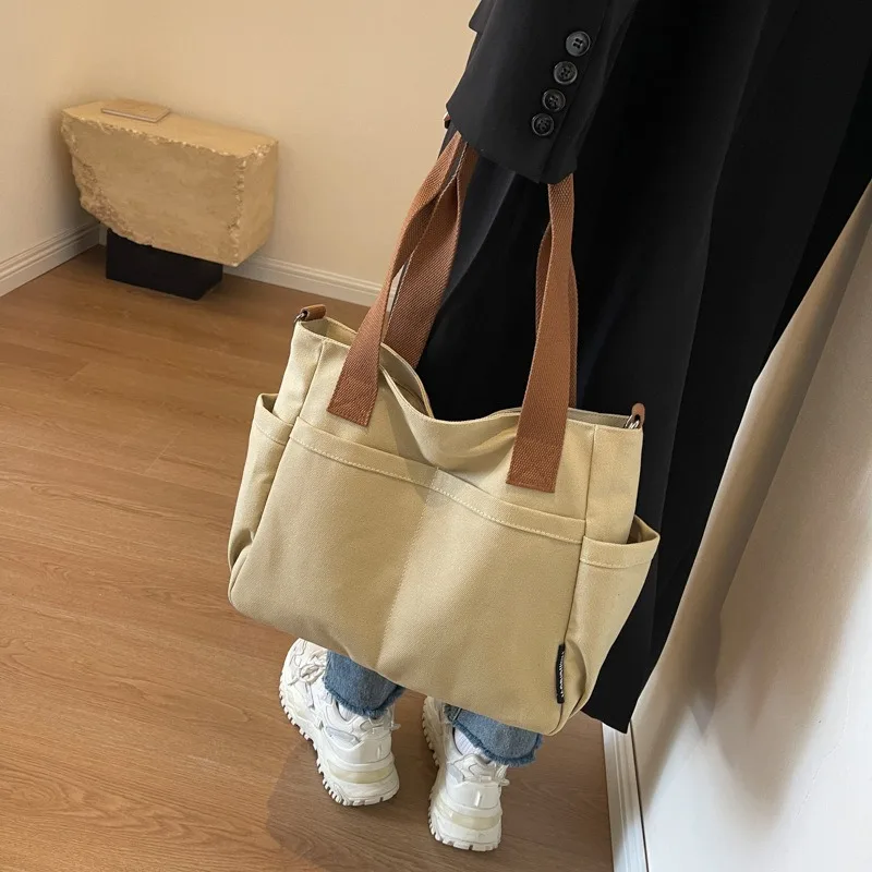 

Fashionable minimalist solid color canvas bag, new style college student shoulder crossbody bag, women's casual versatile should