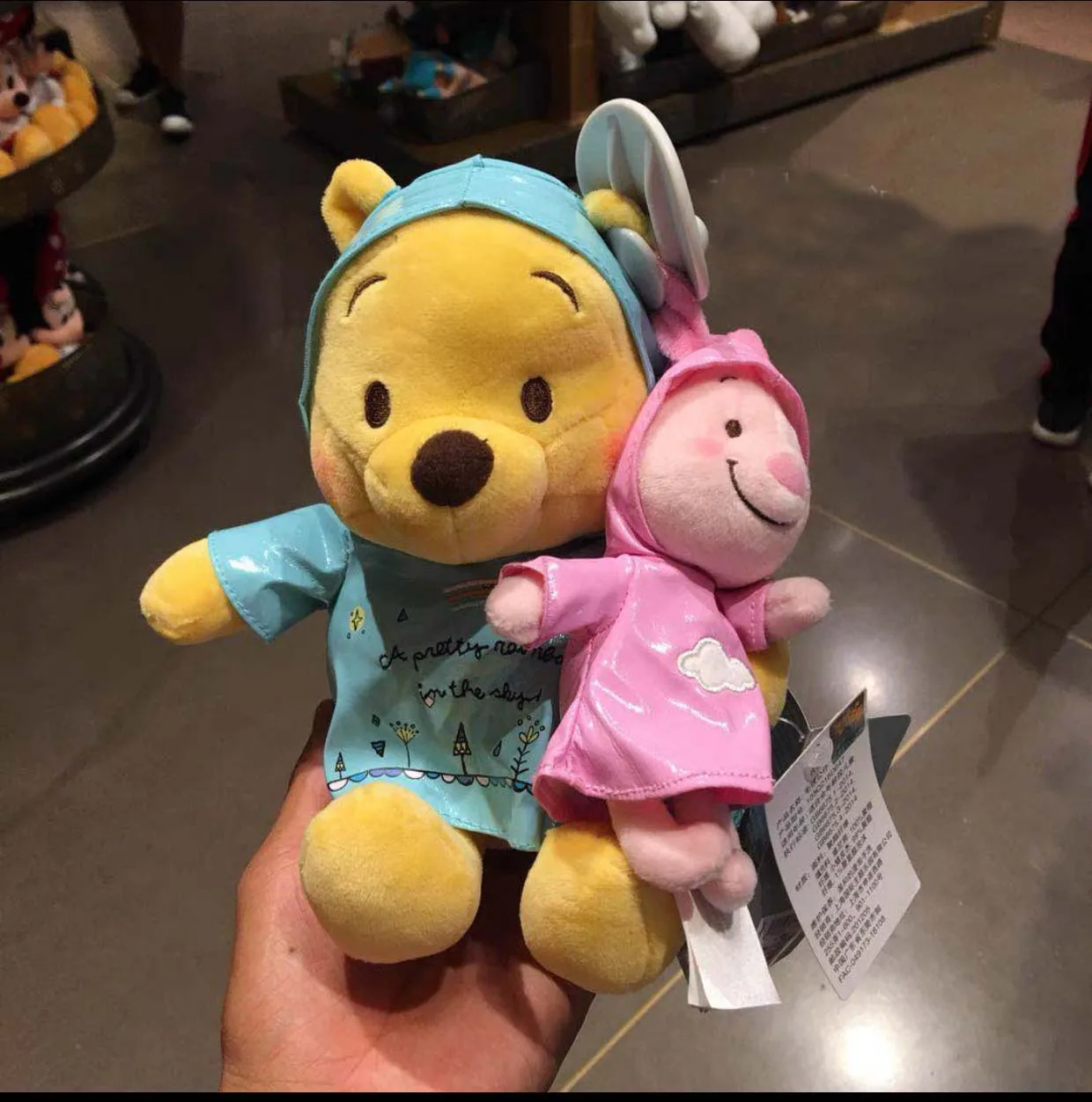 

Disney Winnie The Pooh and Piglet Rainy Day 22cm Plush Set Raincoat