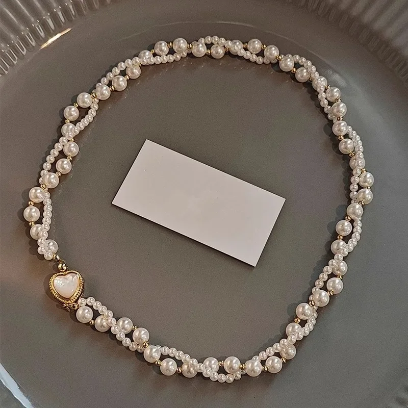 

Love Mother-of-pearl Buckle Double-layer Shijia Pearl Necklace Jewelry Female Niche Beaded Cross Design Autumn and Winter Sweate