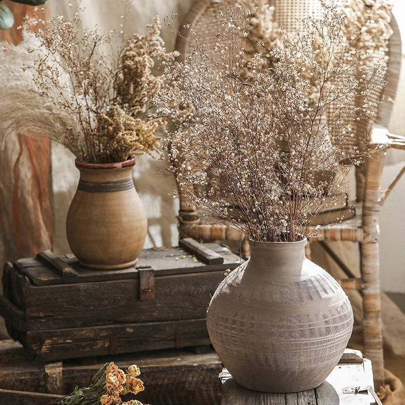 Vintage distressed stoneware vase ornaments, yellow wabi-sabi style homestay, living room, dried flowers, flower