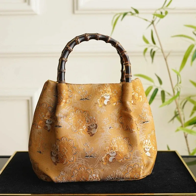 

Heavy Song Jin intangible cultural heritage silk bamboo handbag, national style gold niche single shoulder handbag
