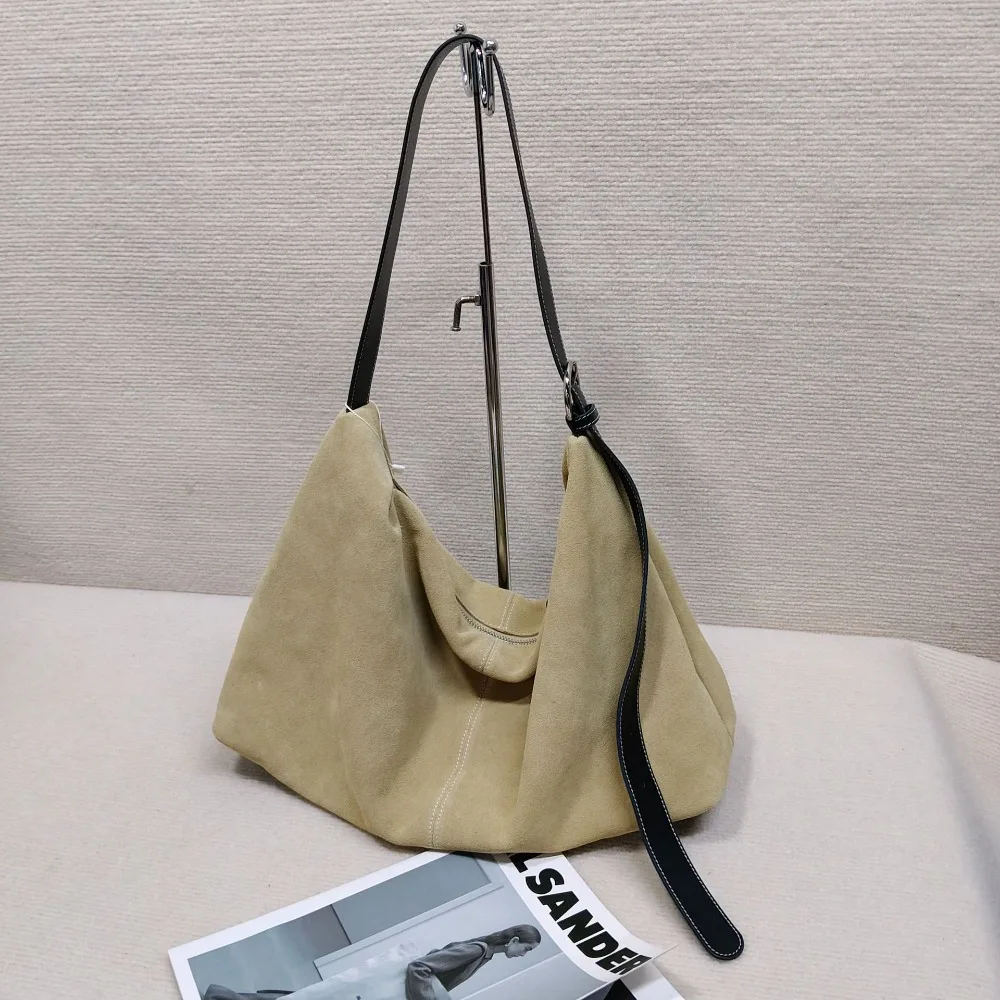 Retro Cowhide Women's Bag New Capacity ShoulderCommuter Messenger Fashionable Texture Unique Dumpling Simpleand Large Texture