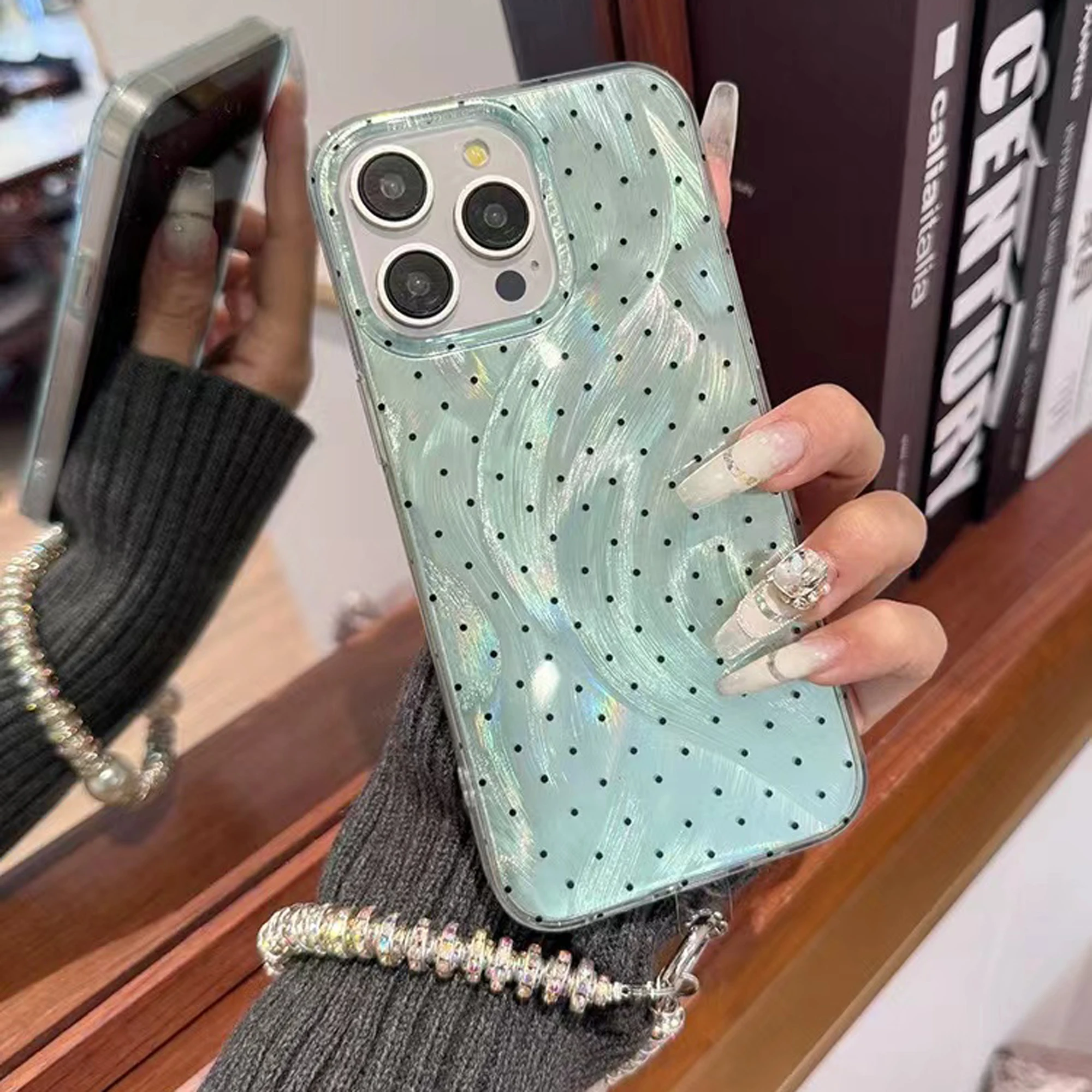 The new colorful polka-dot phone case with chain is suitable for iPhone 15 14 13 12 11 all-inclusive shock-proof girl phone case