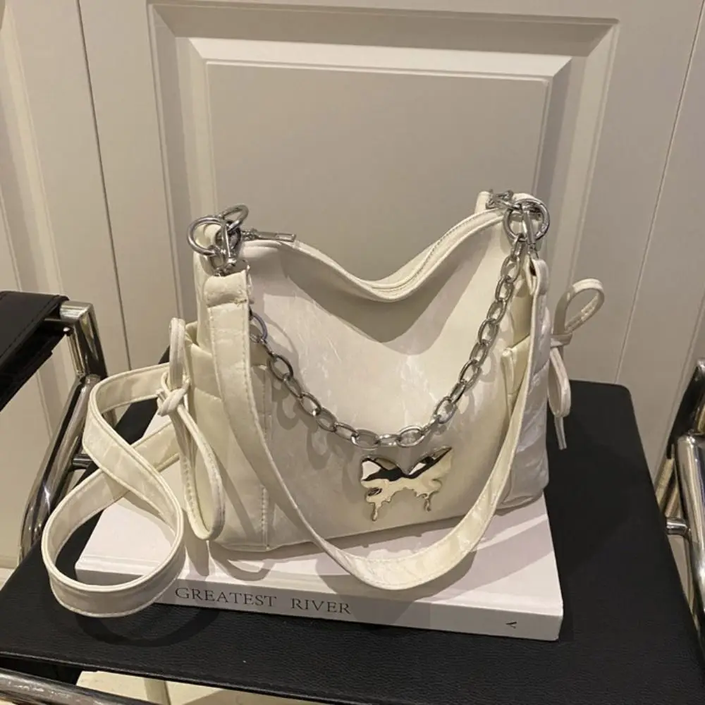 

Сумка через плечо с декором в виде бабочек, серебристая, с металлической цепочкой и жемчужной цепочкой, на шнурке, универсальная, в корейском стиле