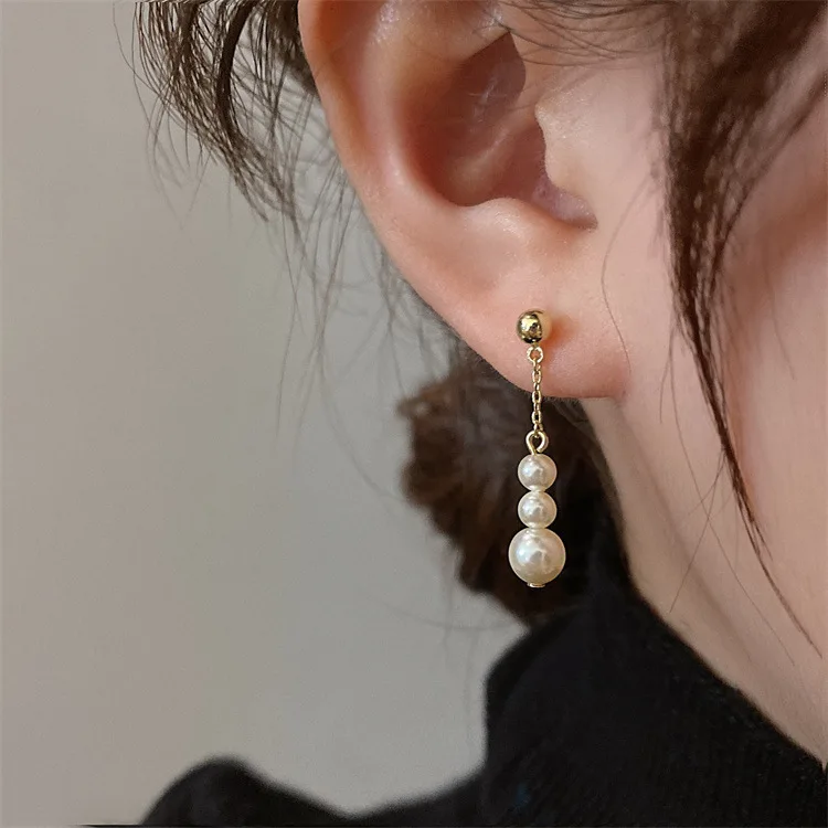 925 Silver needle temperament elegant white imitation pearl tassel earrings Fashion net red stud size pearl string earrings