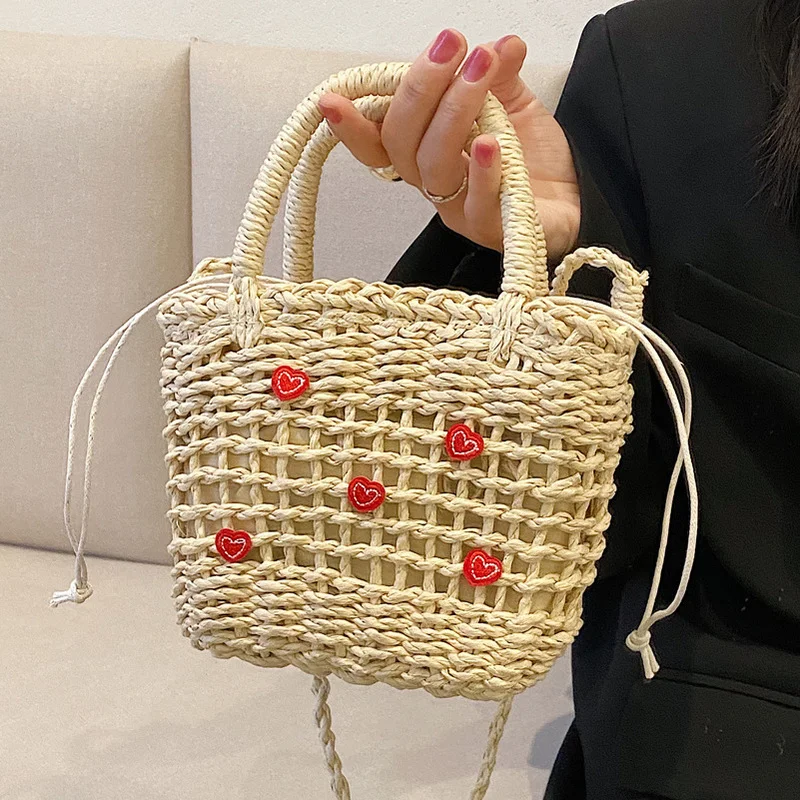 Borsa di paglia da spiaggia estiva bohémien borsa da donna tessuta a mano di moda borsa a secchiello femminile di design di alta qualità Shopper Love Money Bag