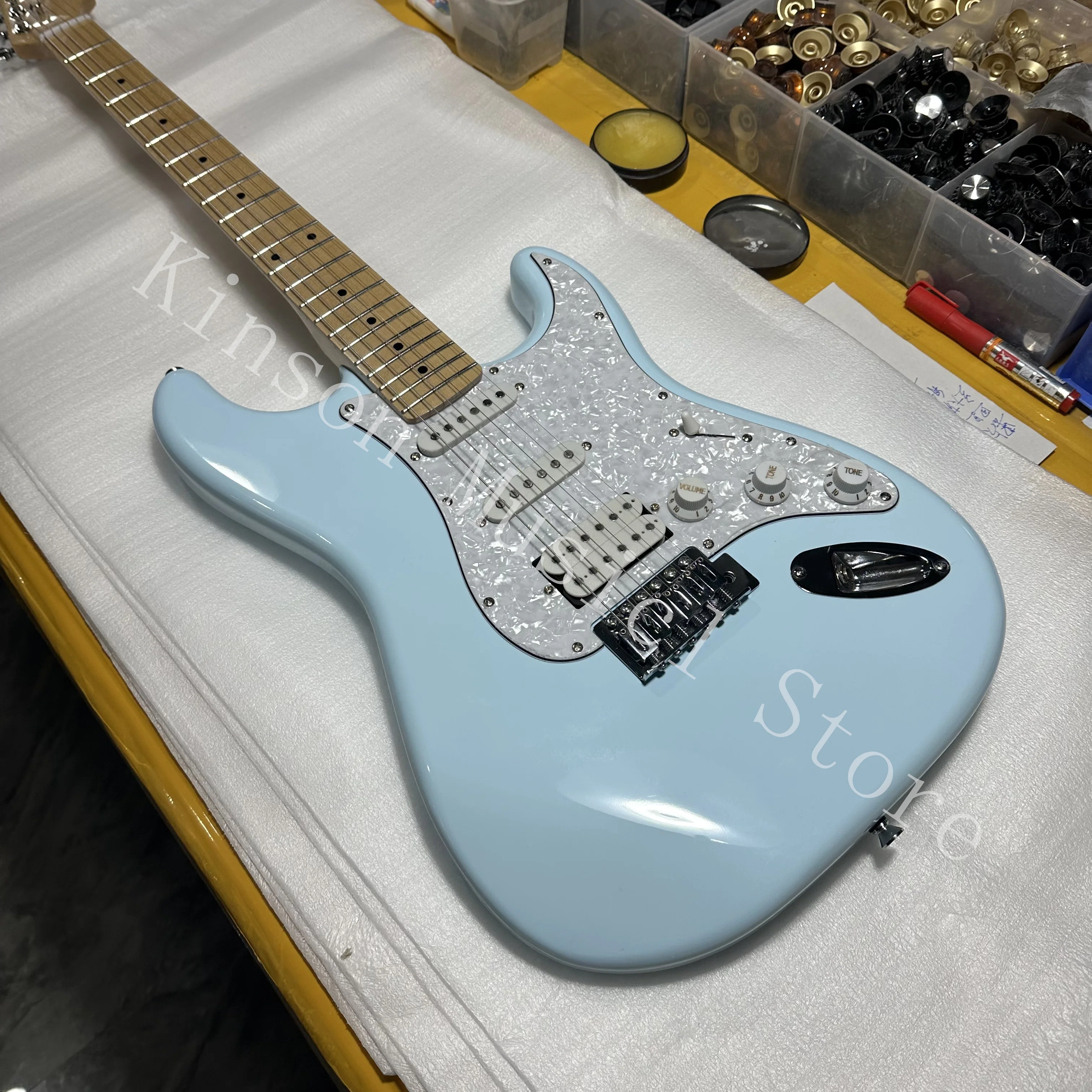 

Sky Blue Color Electric Guitar, Mahogany Body, White Pearl pickguard, Maple Fingerboard, 6 Strings Guitarra,free shipping