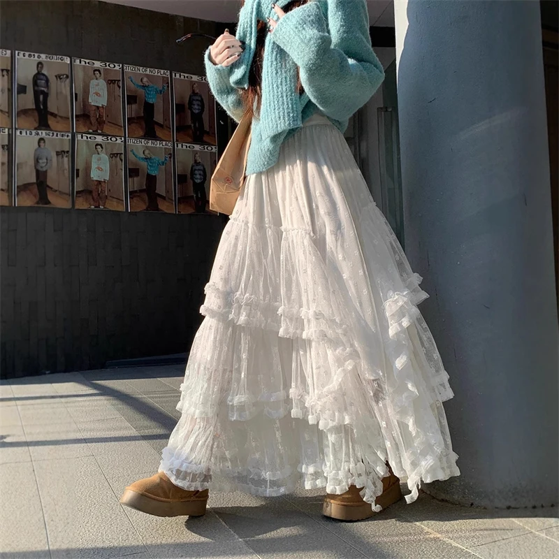 

Белая юбка-тортик Джокер, женская длинная сетчатая юбка, трендовая весна 2026, новинка, милый цветок, марля, тяжелое дерево, нерегулярная юбка для ушей