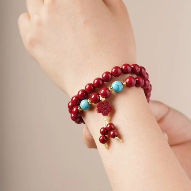 

Cinnabar double-loop bracelet men and women, with a lotus pendant for the zodiac year, available in-store