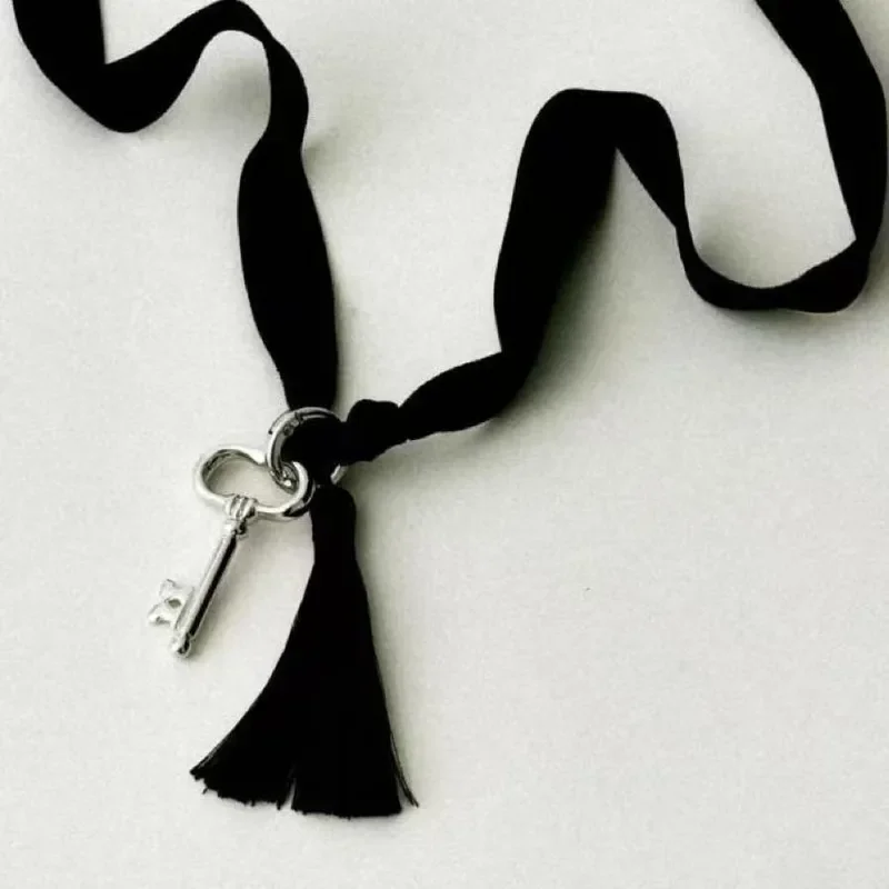 24 new niche design black ribbon necklace temperament simple cold wind long pendant fashionable versatile sweater chain