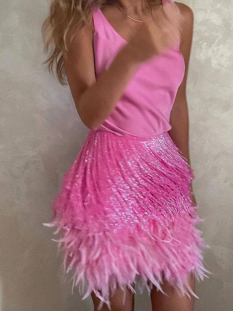 Conjuntos de vacaciones ajustados a la moda para mujer, novedad de verano, minifaldas con lentejuelas, trajes elegantes con cuello en U, camisetas sin mangas y faldas con plumas y borlas