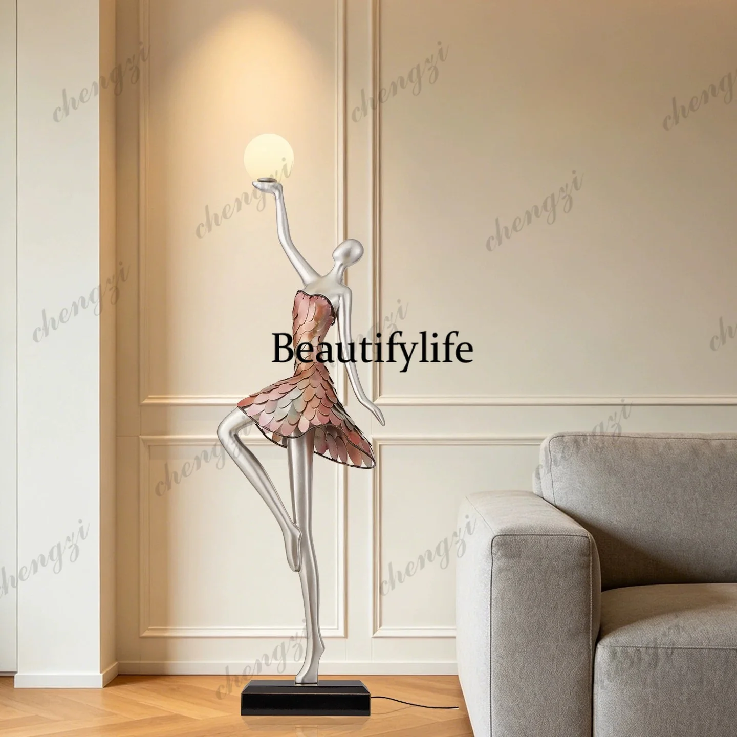 Living room decorations: human-shaped ornaments, light luxury sculptures, large floor-standing gifts beside the TV cabinet