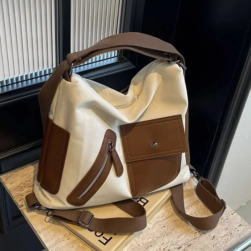 Bolso de mano de gran capacidad para mujer, bolsos de un solo hombro de lona versátiles, mochila de viaje saliente de moda Ins, XK229