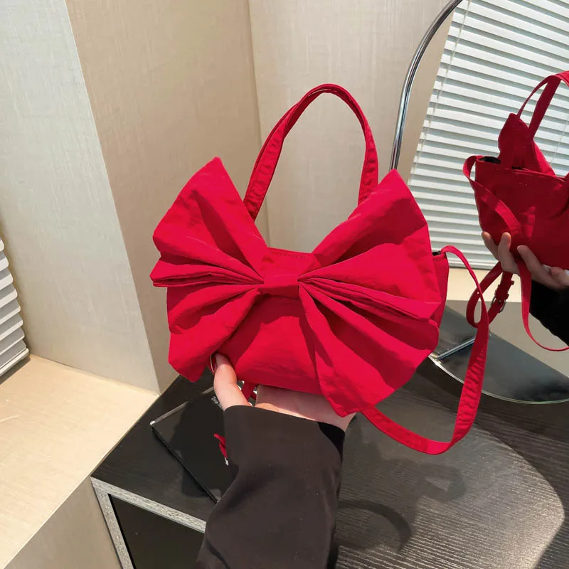 

Exquisite Hasp Nylon Bow Solid Color Shoulder Bags Fashion 2025 Hot Sale Bags for Women Sewing Thread Commuting Crossbody Bags