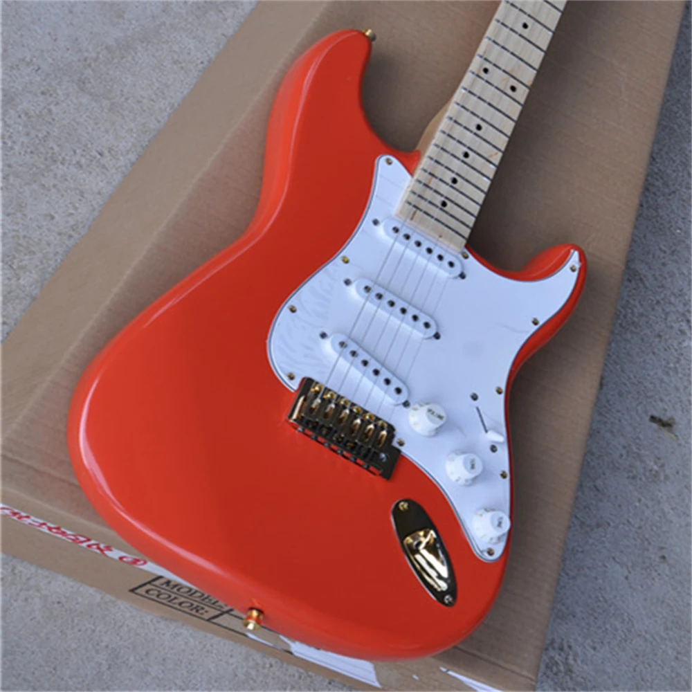 

Custom 6-string bright orange electric guitar with a white protective cover