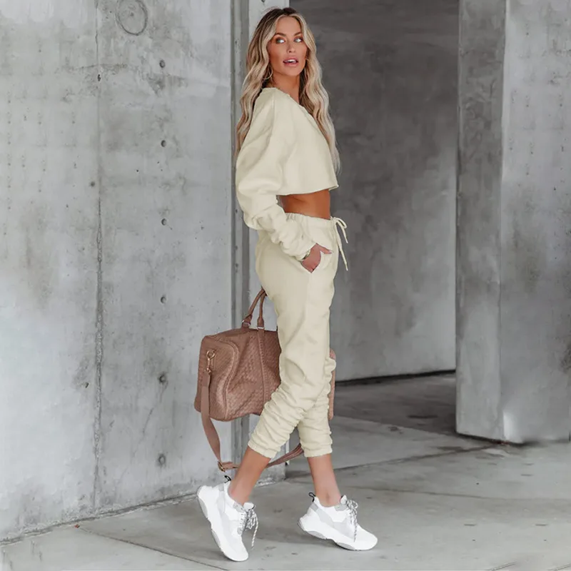 Autunno nuova felpa con cappuccio ultra corta casual pantaloni lunghi da donna set da 2 pezzi moda elastico in vita con lacci tasca pantaloni lunghi set di abbigliamento sportivo