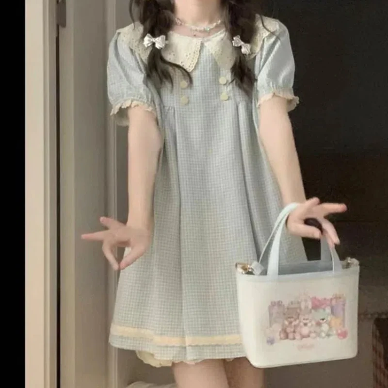 

Japanese Sweet Cute Plaid Lolita Summer 2024 New Spliced Doll Neck Button Folds Fashion Solid Color Loose Short Sleeved Dresses