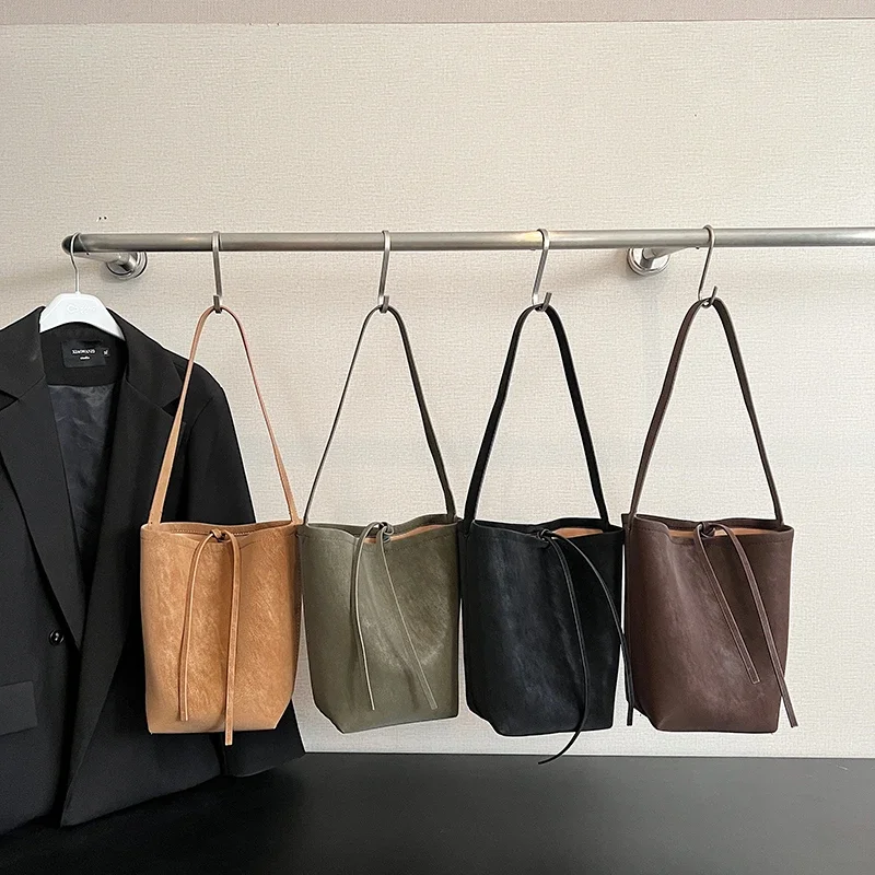 

Fashionable Simple Solid Faux Suede Bucket Shoulder Bags 2026 High Quality Versatile String Large Capacity Handbags for Women