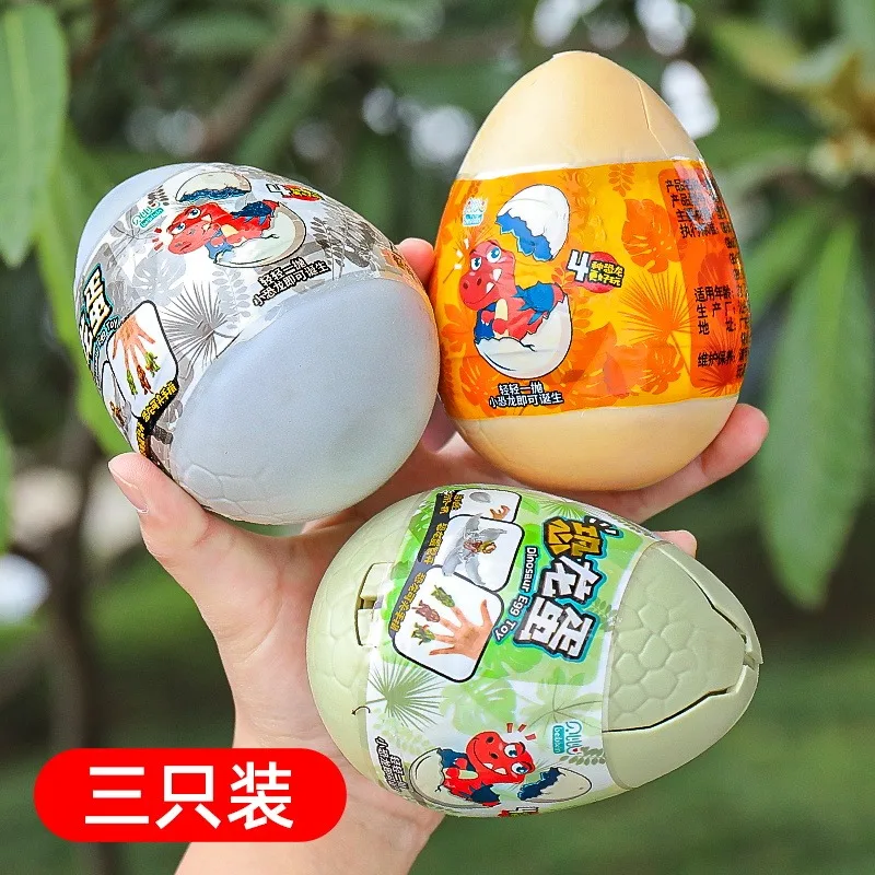 Huevos de dinosaurio de juguete para niños, lindos, con diseño de tiranosaurio rex que se muerde el dedo, caja sorpresa, modelo de animal de simulación