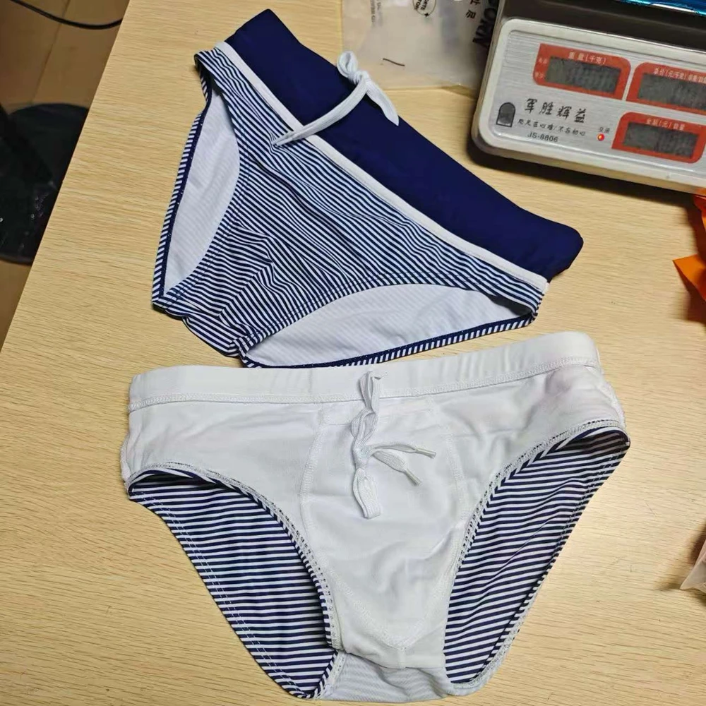 2026 Triangle swimming trunks men's striped fashion elastic youth trunks seaside beach professional10052