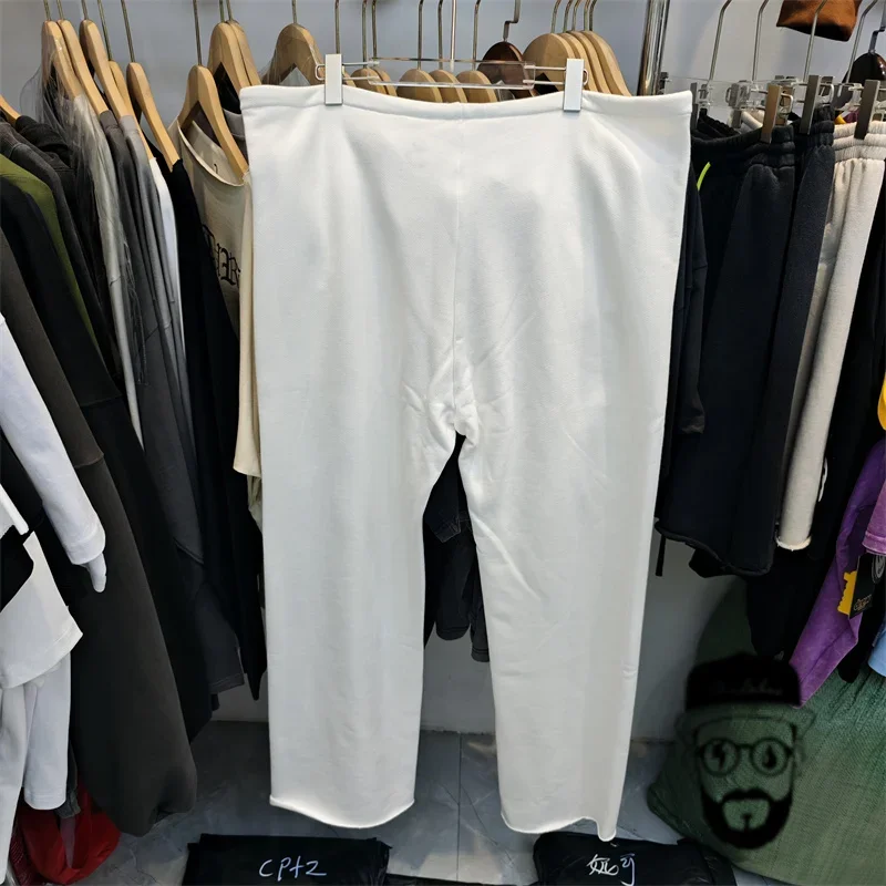 Pantaloni in velluto kanye in bianco e nero con logo stampato pantaloni casual da uomo e da donna baggy hosen