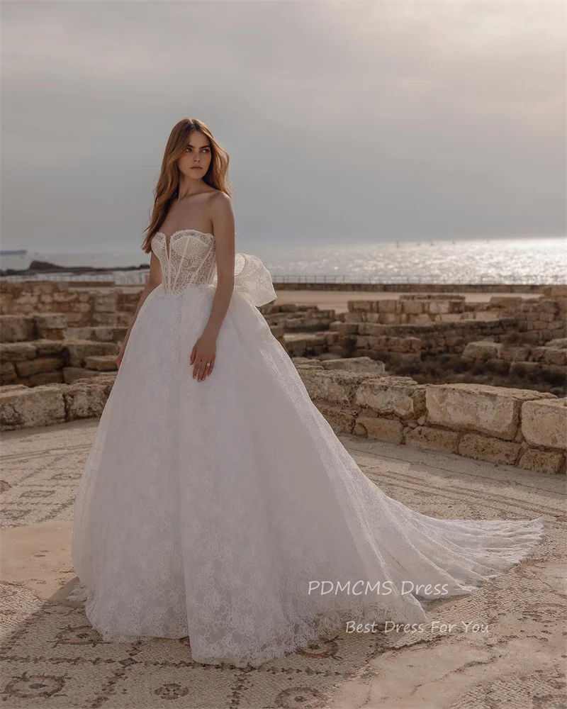 Vestidos de novia sexys de línea A para playa, vestidos de novia con lazo de encaje modesto, vestidos de novia de princesa, tren largo, vestido de novia clásico elegante