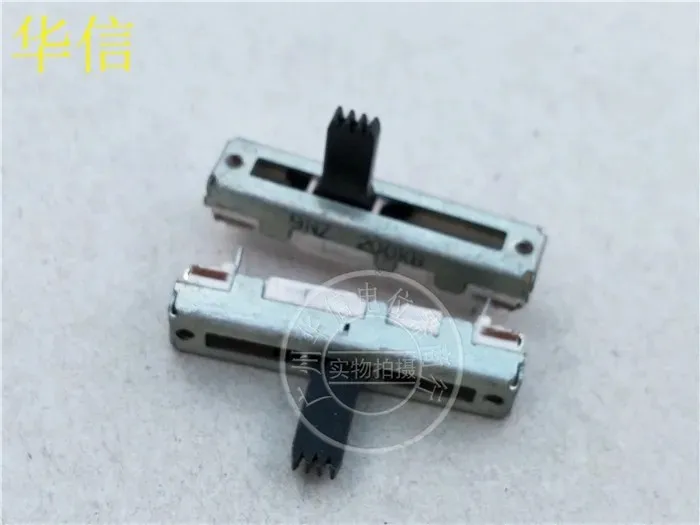 The NOBLE 30MM slide-flipper potentiometer B50k has a white handle 10MM in length