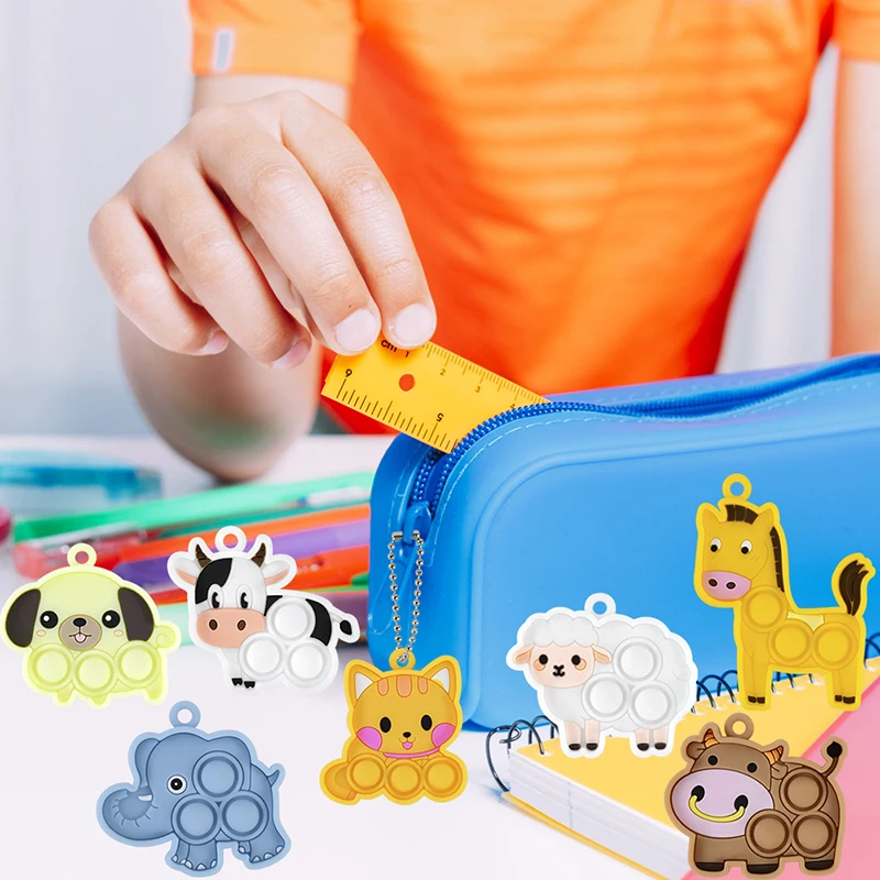 Mini llavero de dibujos animados de 7 piezas para niños, juguetes sensoriales Kawaii para aliviar el estrés, perro, gato, elefante