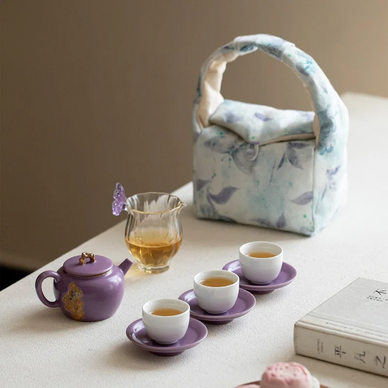 complete set of storage bag, teapot and tea set.