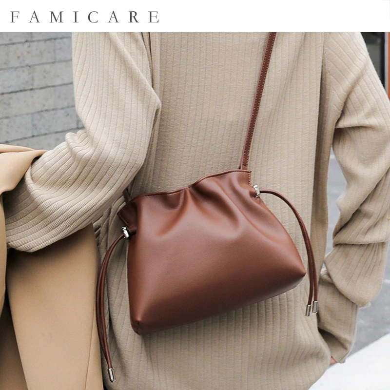 

2026 Trendy Women Soft Cloud Drawstring Bag Compact Mini Crossbody Purse Lightweight Phone Bag Ideal For Street Fashion Looks