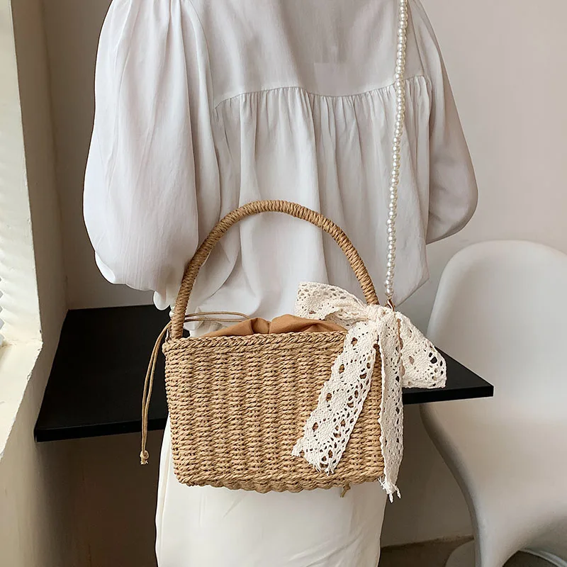 Neue Perle Strohs ack Sommer hand gewebte Umhängetasche weibliche gewebte Korb Frauen Handtasche Strand Damen Reise Umhängetaschen