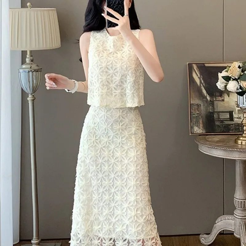 

Новый французский кружевной летний женский комплект из двух предметов, модный кружевной топ без рукавов с круглым вырезом + тонкая юбка-миди с высокой талией, элегантный костюм