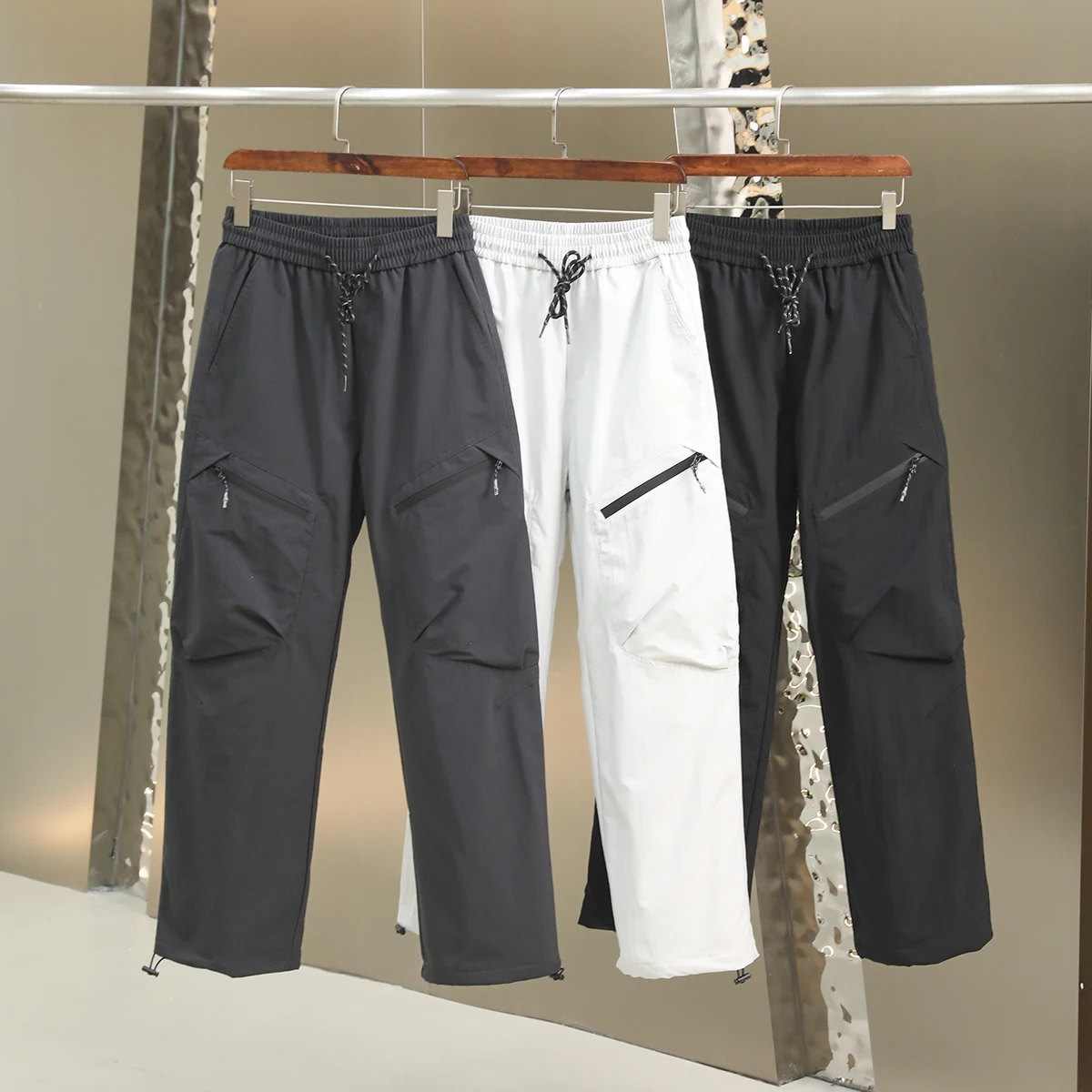 

Водонепроницаемые пуховые брюки для мужчин, высококачественные, с наполнителем из 90% пуха, ветрозащитные, теплые, для активного отдыха, рабочая одежда, длинные брюки, модные, городские, стильные