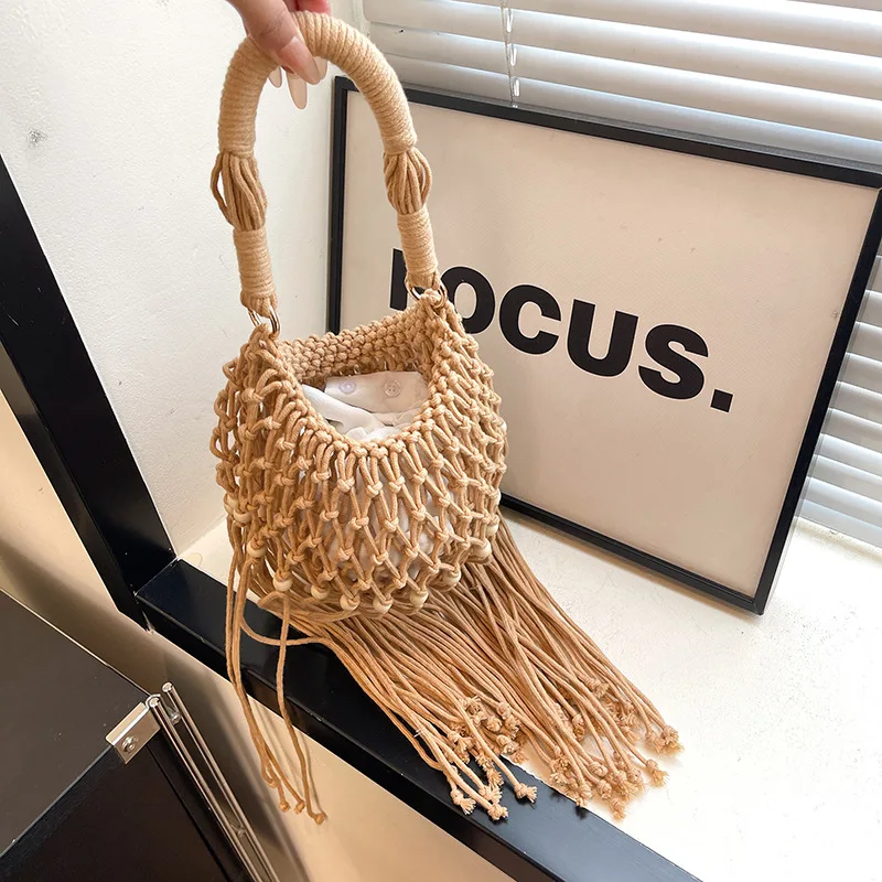 

Summer new hollow tassel woven handbag fashion trend forest vacation beach bag