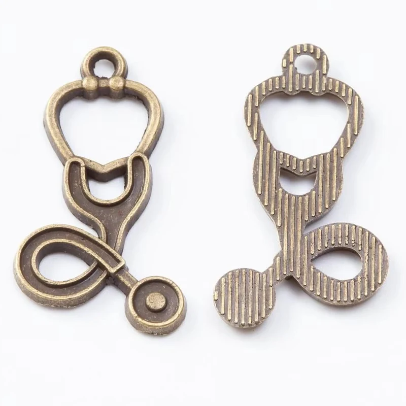 100pcs 28*16MMAncient Copper Metal Zinc Alloy Japanese And Korean Light Luxury Simple Fashion Stethoscope Pendant. Girl Gift Bag