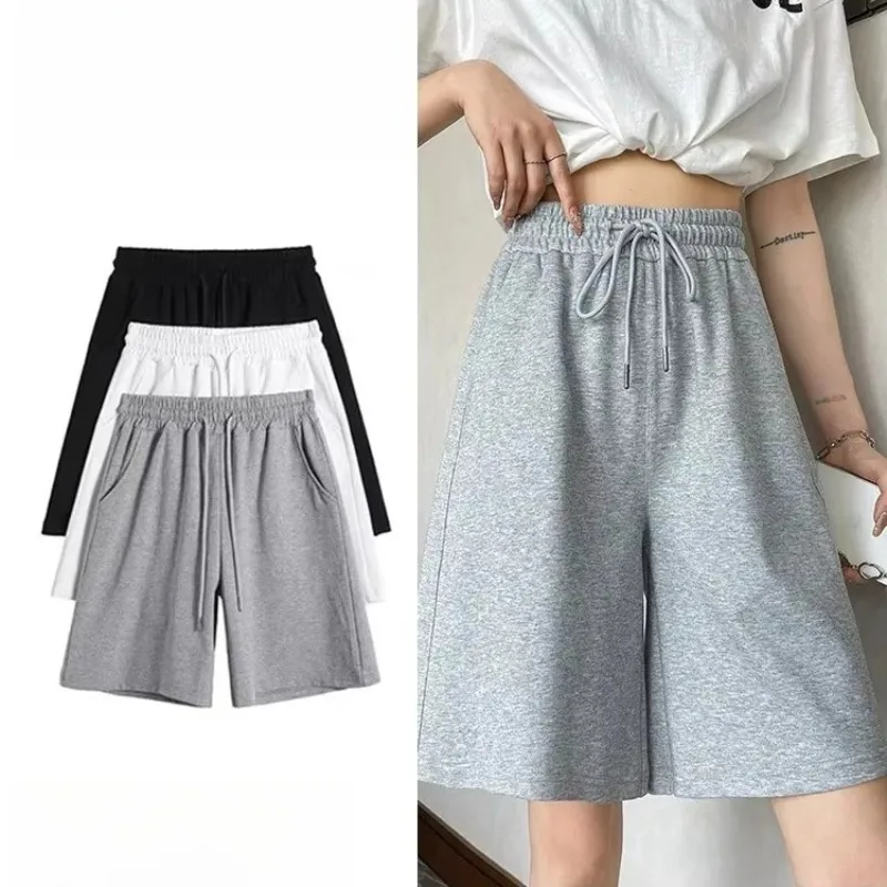 شورت رياضي قطني بلون سادة للنساء سروال رفيع بخمس نقاط للجري فضفاض واسع الساق مقاس كبير