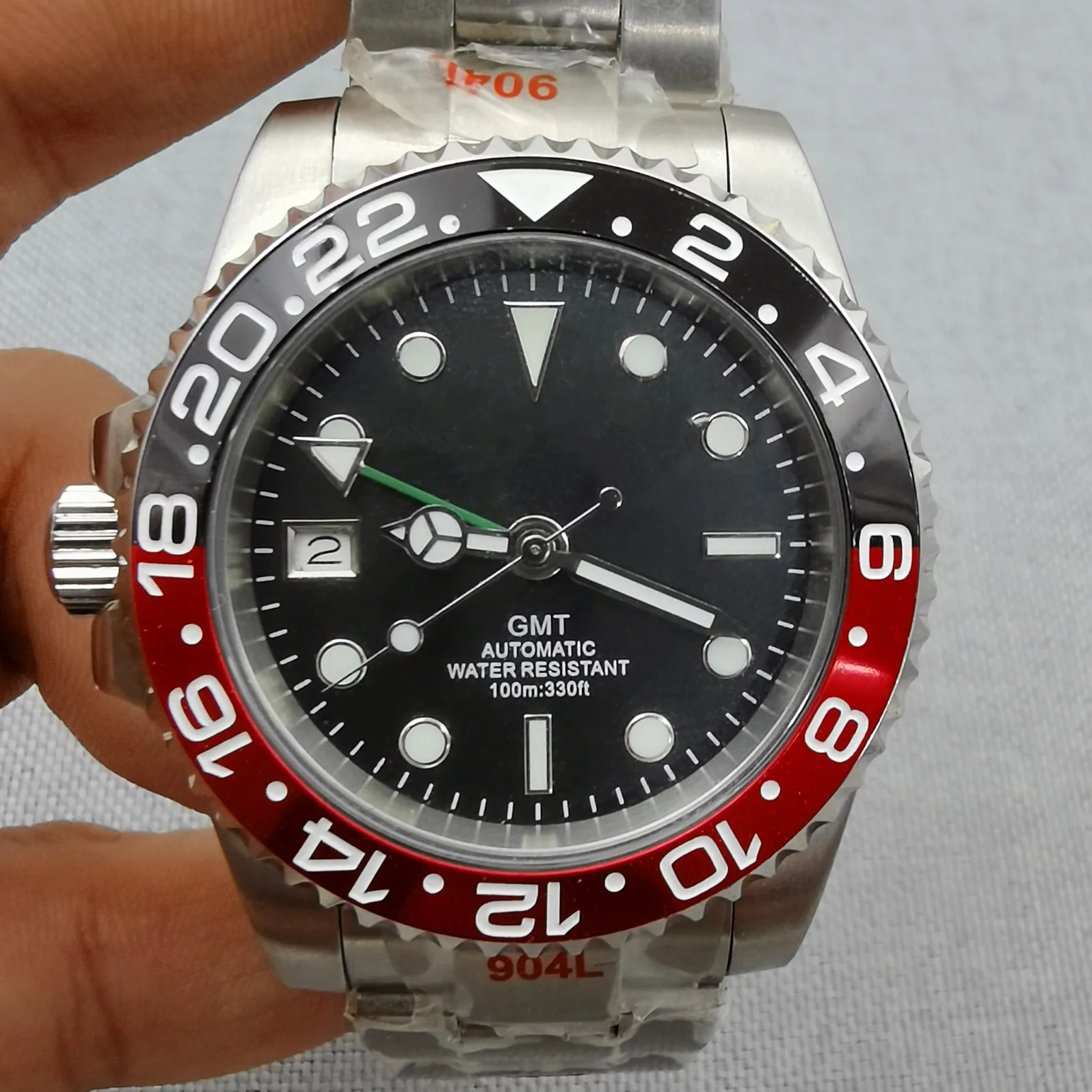 New Gmt Dual Time Zone Displays A 100-Meter Waterproof Left Crown Stainless Steel Watch Japan Nh34 Greenwich Automatic Movement