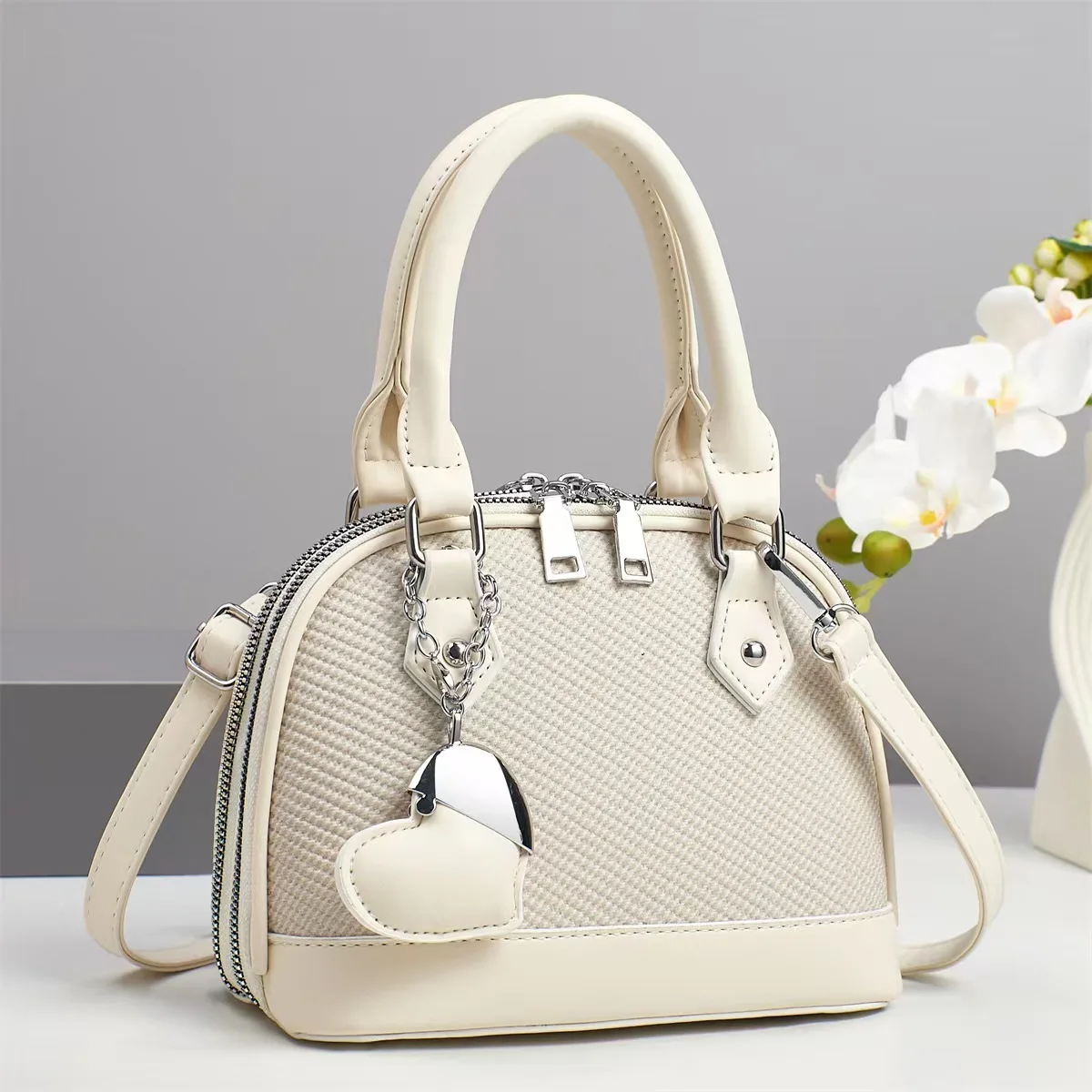 

2025 Versatile Womens Handbags Fashion Single Shoulder Elegant Love Herat Mom Handheld New Lychee Pattern Crossbody Bag