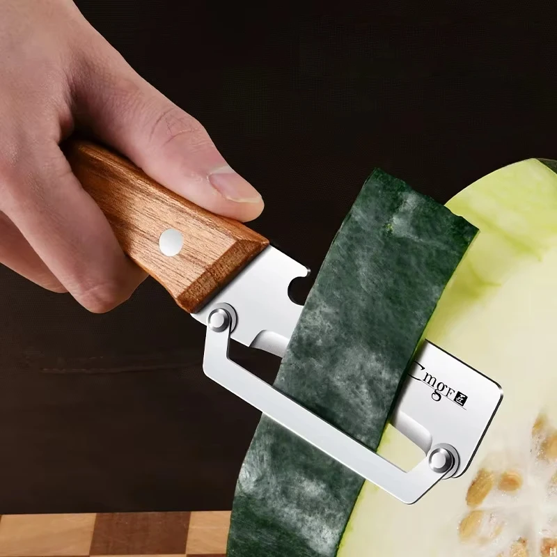Stainless steel peeler with wooden handle for peeling and slicing fruits and vegetables | Durable and smooth operation - Image 3