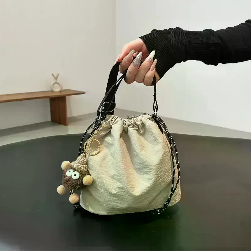 Nylon Drawstring Crossbody Bag With Cute Plush Charm Adjustable Strap For Daily Shopping Travel - view 2