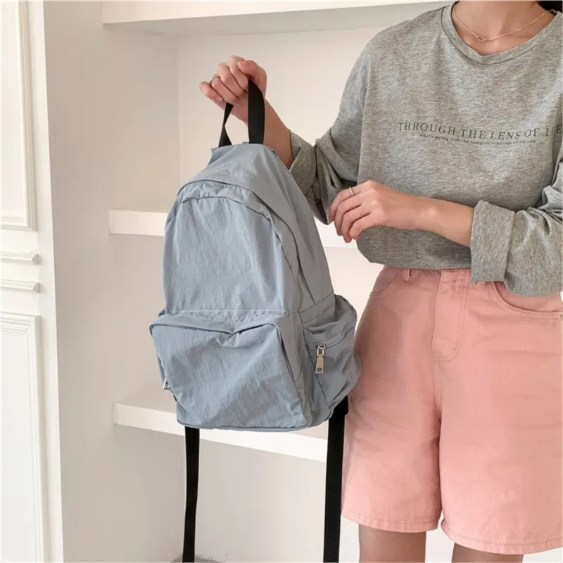 Zaino per studenti universitari di grande capacità donna 2024 borsa da scuola per zaino in Nylon coreano di nuova moda Versatile zaini Casual solidi