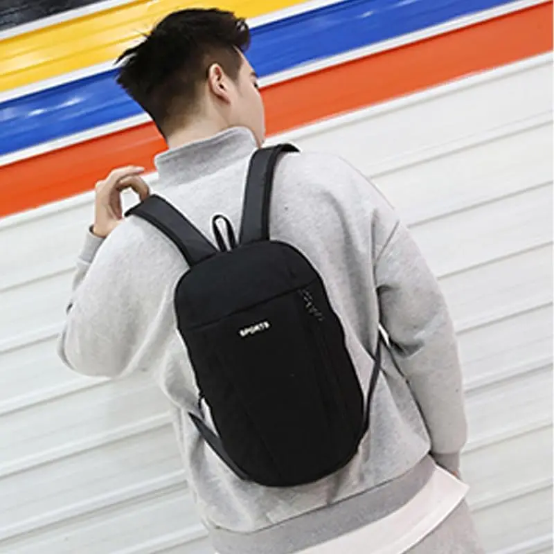 حقيبة ظهر صغيرة للرجال والنساء - حقيبة نهارية كاجوال خفيفة الوزن للسفر والمشي لمسافات طويلة والاستخدام اليومي (أسود)