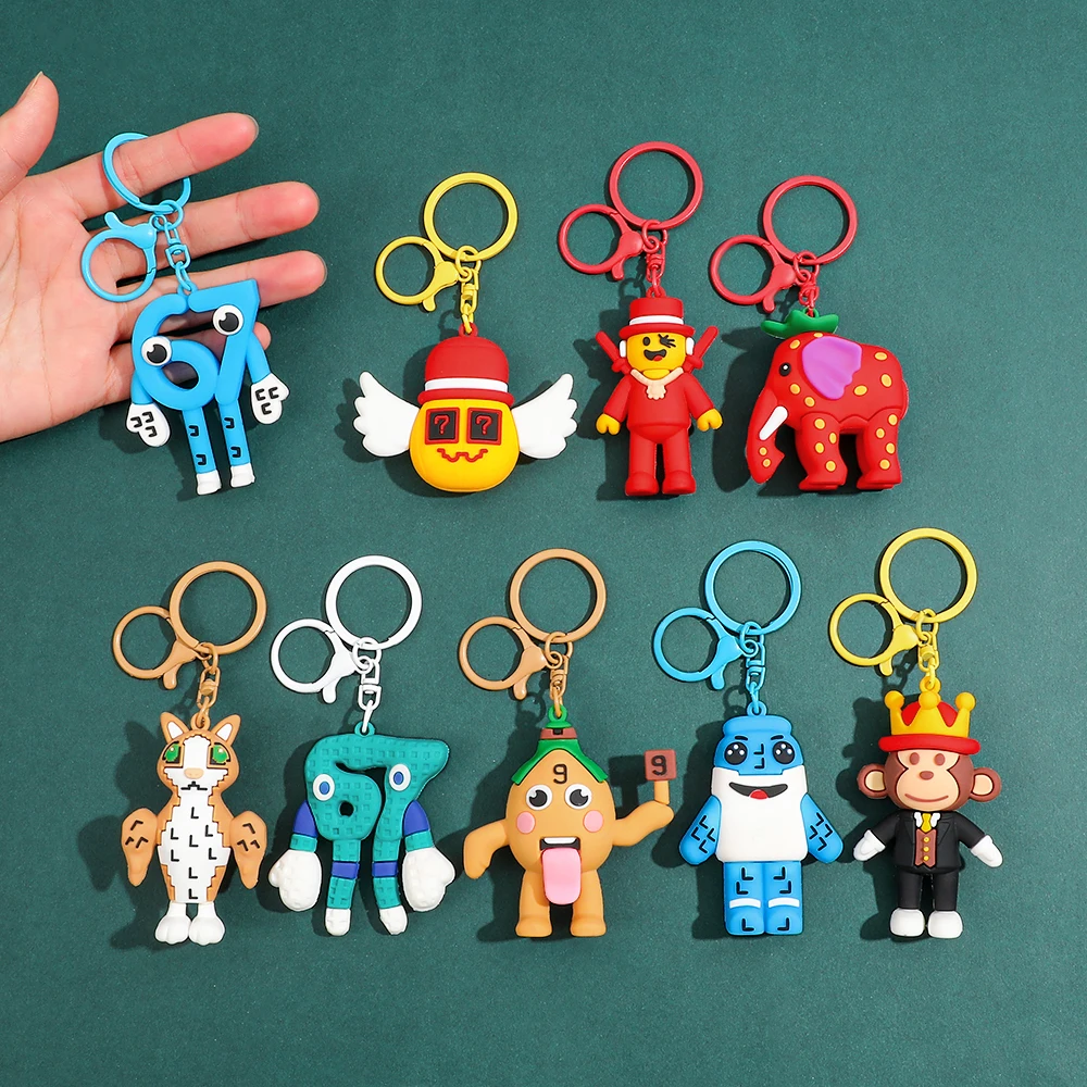 פלדת אל-חלד בצבע כחול בראיינרוט 67 מחזיק מפתחות צעצוע בית חמוד בובות משחק סביב כחול מספר. 67 צעצועים בובת PVC למתנת יומולדת לילדים