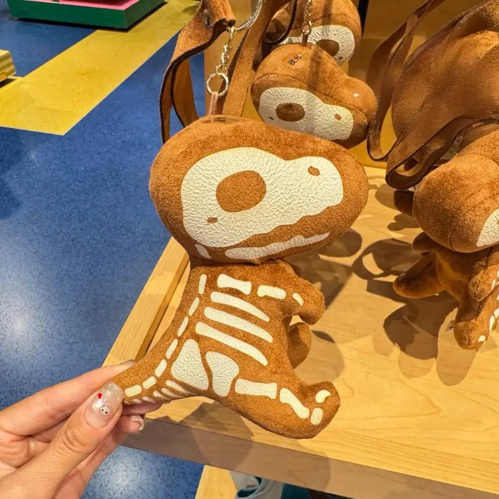 

Universal Studios Beijing Jurassic Fossil Dinosaur (Tyrannosaurus Rex) Glow-in-the-Dark Plush Bag Charm/Keyring