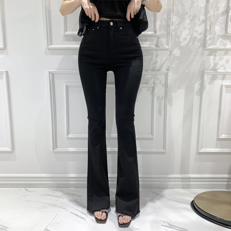 Jeans sexy a vita alta con campana Bot da donna che sollevano il sedere bianco latte semplice coreano Sle pantaloni in denim a gamba lunga in cotone elasticizzato
