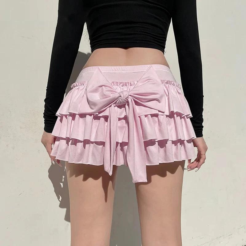 Minifalda de cintura baja estilo Lolita Kawaii, falda de múltiples capas con volantes escalonados, lazo trasero rosa, estilo japonés dulce