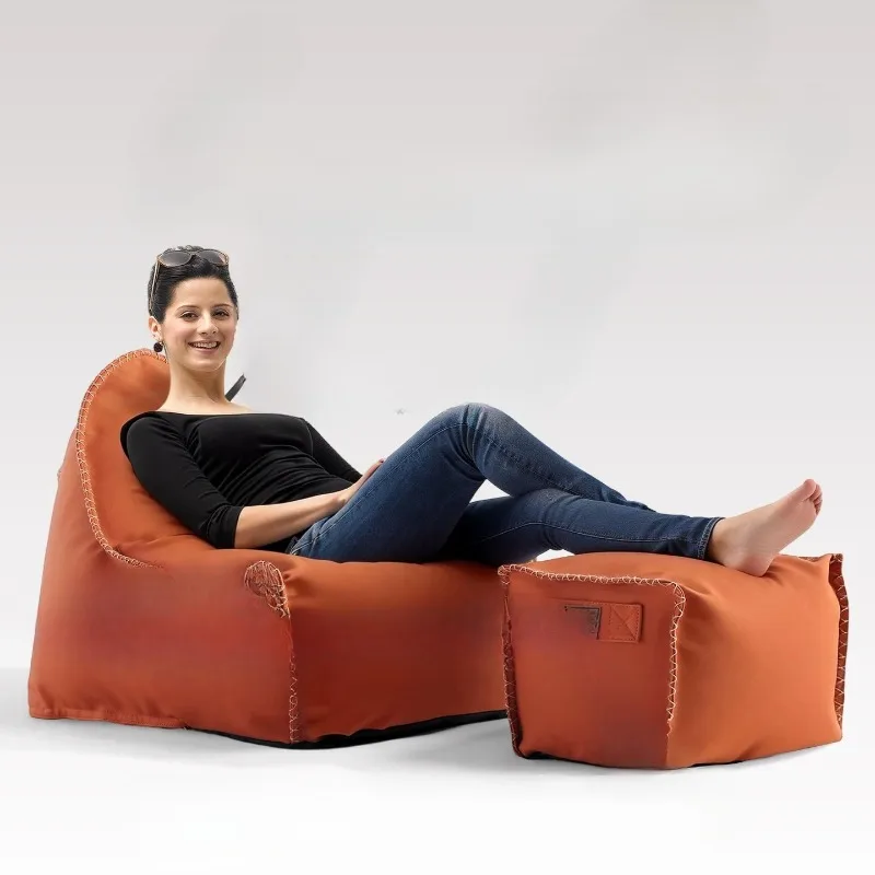 Lazy sofa on the carpet, reclining and sleeping small apartment balcony sofa