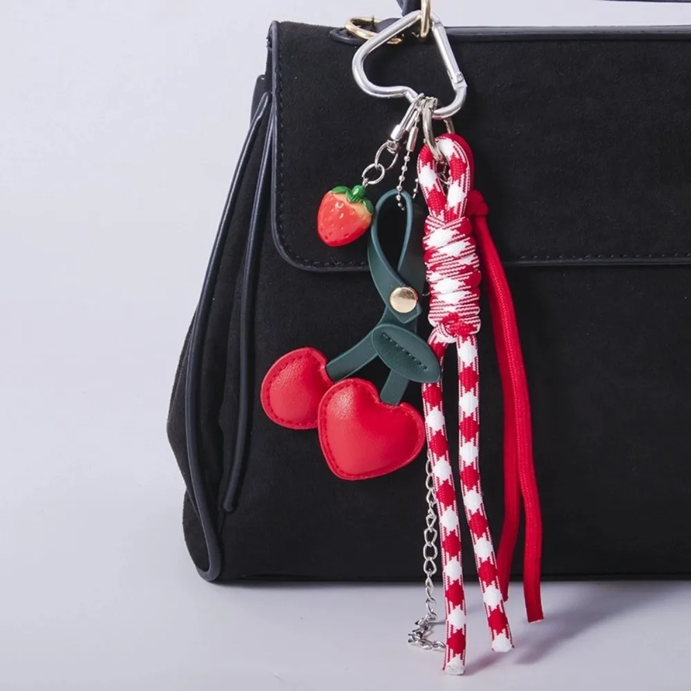 

Red And Black Leather Rope Keychain Leather Material Charm Pendant Weaving Rope Keychain Weaving Style Cherry Pendant