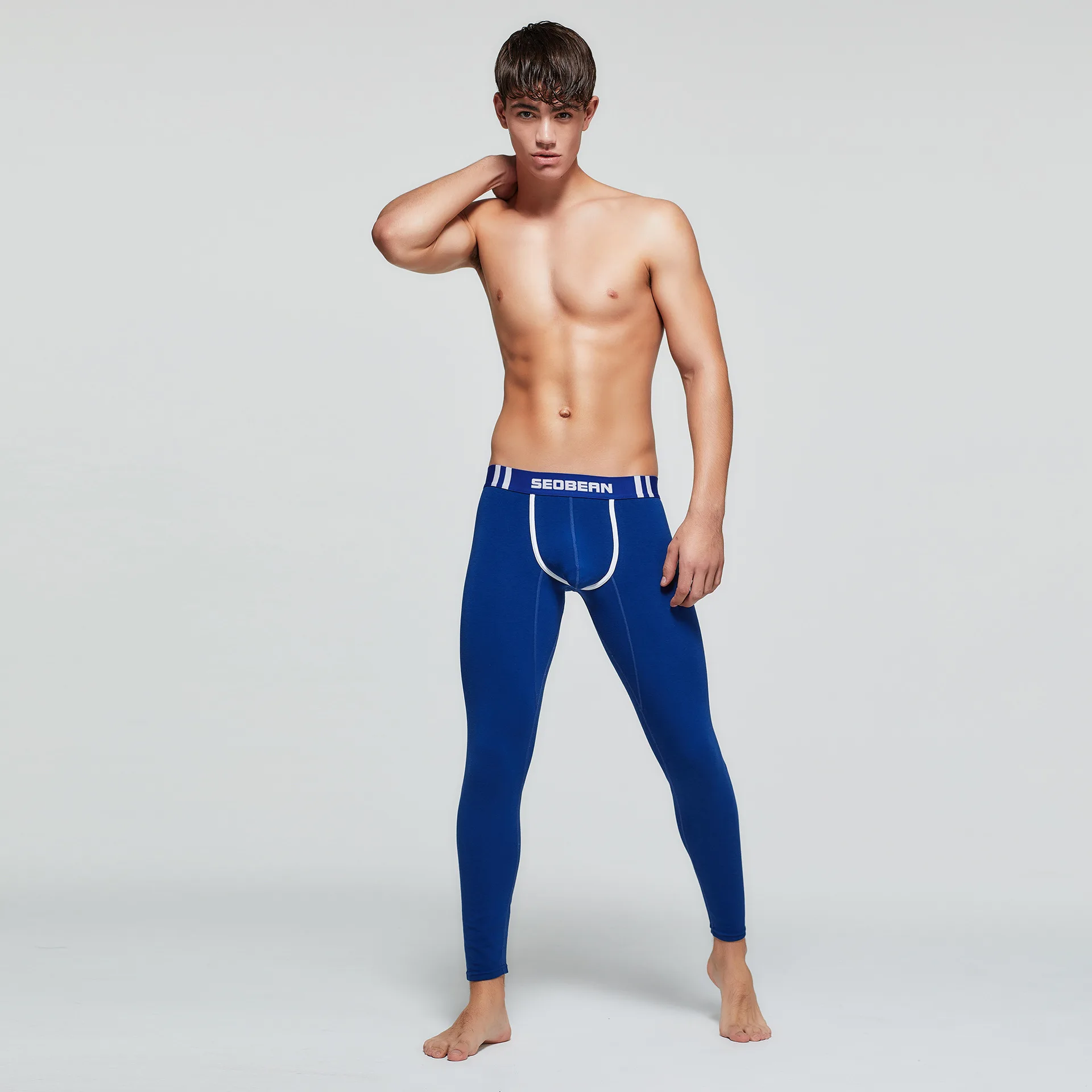 Winter men's thermal long johns spot wholesale, men's solid color slim-fitting thin leggings D90402